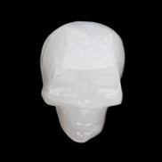 Mangano Calcite skull 35*47*40mm 117g in sunlight - Rocks and Things Store
