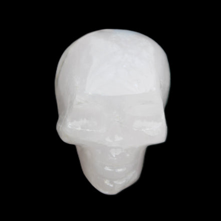 Mangano Calcite skull 35*47*40mm 117g in sunlight - Rocks and Things Store