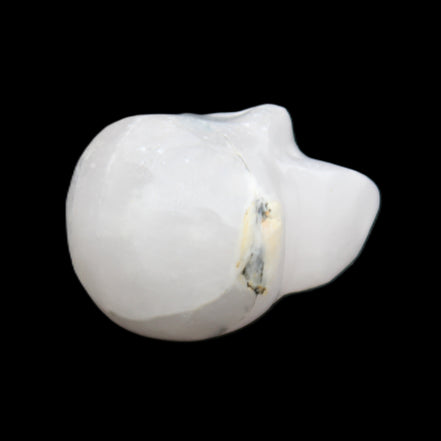 Mangano Calcite skull 35*47*40mm 117g in sunlight - Rocks and Things Store