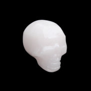 Mangano Calcite skull 24*38*32mm 48g in sunlight - Rocks and Things Store