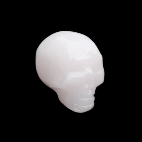 Mangano Calcite skull 24*38*32mm 48g in sunlight - Rocks and Things Store