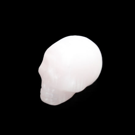 Mangano Calcite skull 24*38*32mm 48g in sunlight - Rocks and Things Store