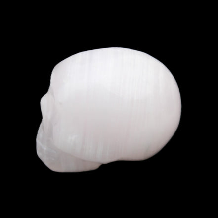 Mangano Calcite skull 24*38*32mm 48g in sunlight - Rocks and Things Store