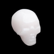 Mangano Calcite skull 24*38*32mm 48g in sunlight - Rocks and Things Store