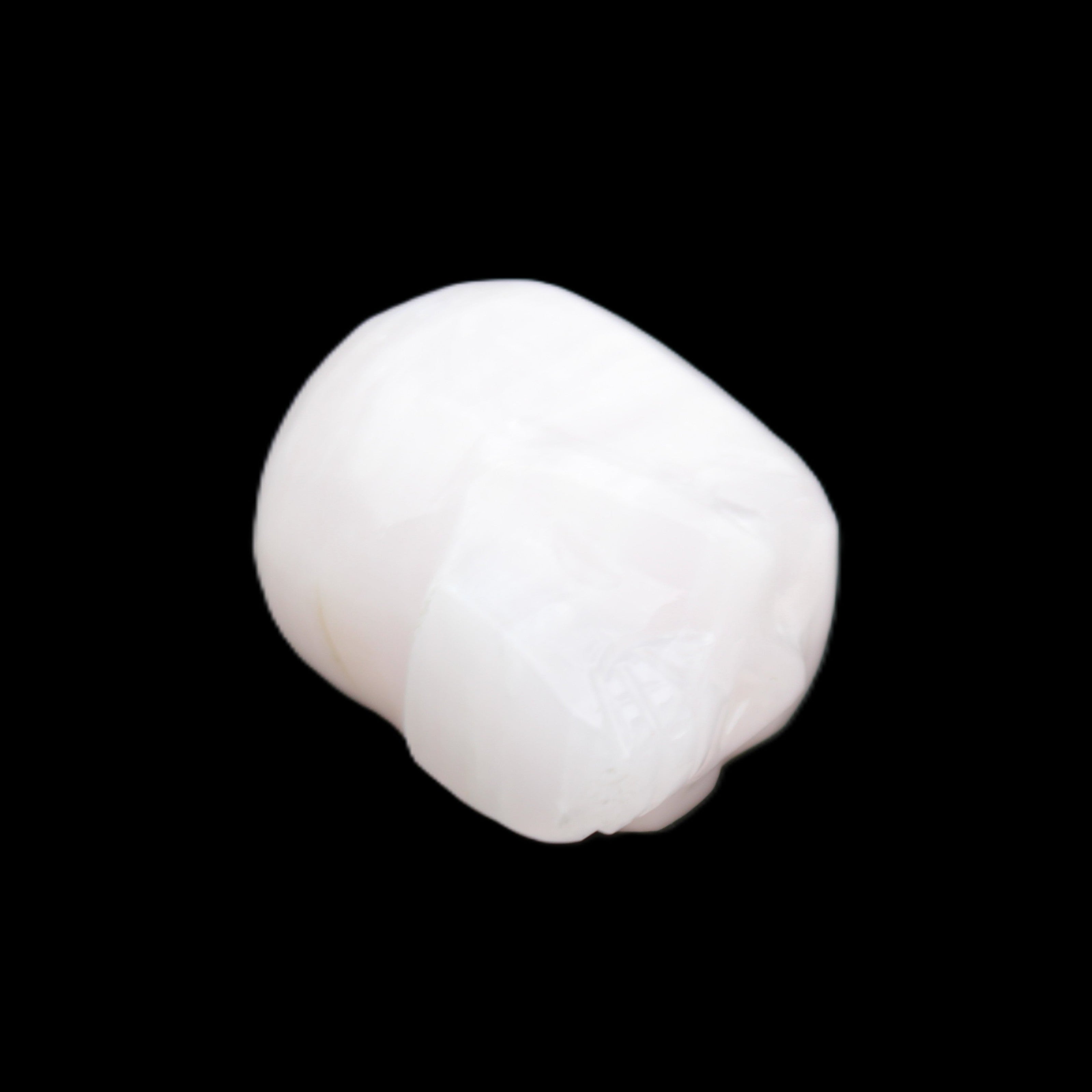 Mangano Calcite skull 24*38*32mm 48g in sunlight - Rocks and Things Store