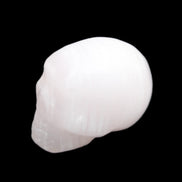 Mangano Calcite skull 24*38*32mm 48g in sunlight - Rocks and Things Store