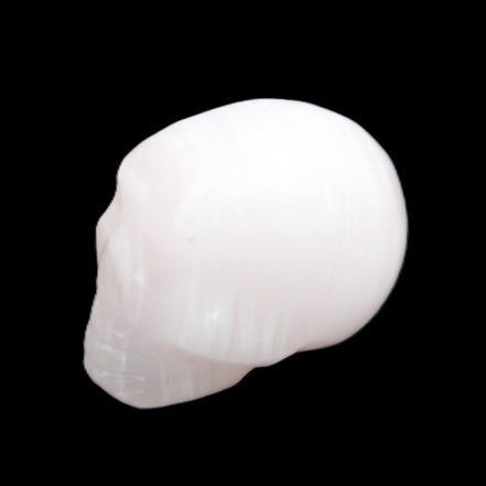 Mangano Calcite skull 24*38*32mm 48g in sunlight - Rocks and Things Store