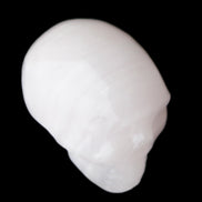 Mangano Calcite skull 24*38*32mm 48g in sunlight - Rocks and Things Store
