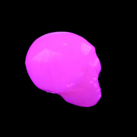 Mangano Calcite skull 24*38*32mm 48g in UV light - Rocks and Things Store