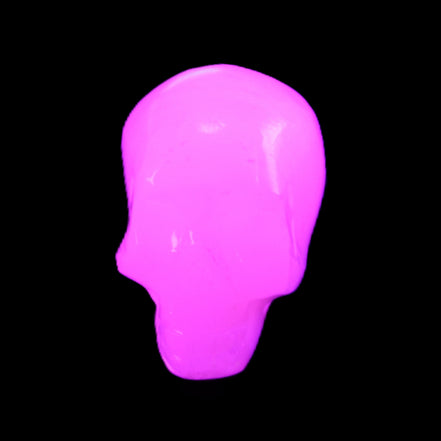 Mangano Calcite skull 24*38*32mm 48g in UV light - Rocks and Things Store