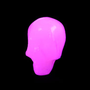Mangano Calcite skull 24*38*32mm 48g in UV light - Rocks and Things Store
