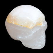 Mangano Calcite skull 38*55*48mm 167g in sunlight - Rocks and Things Store