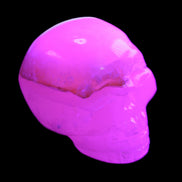Mangano Calcite skull 38*55*48mm 167g in UV light - Rocks and Things Store