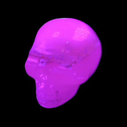 Mangano Calcite skull 38*55*48mm 167g in UV light - Rocks and Things Store