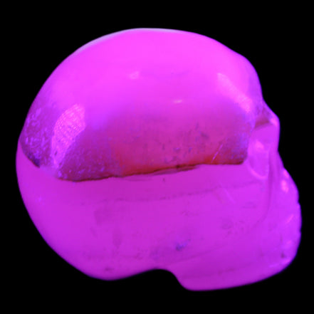 Mangano Calcite skull 38*55*48mm 167g in UV light - Rocks and Things Store