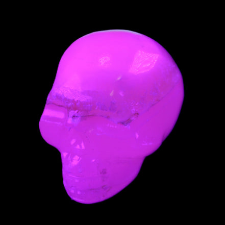 Mangano Calcite skull 38*55*48mm 167g in UV light - Rocks and Things Store