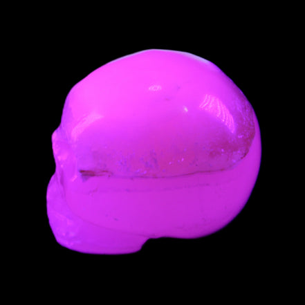 Mangano Calcite skull 38*55*48mm 167g in UV light - Rocks and Things Store