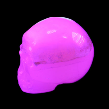 Mangano Calcite skull 38*55*48mm 167g in UV light - Rocks and Things Store