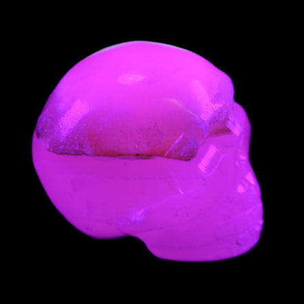 Mangano Calcite skull 38*55*48mm 167g in UV light - Rocks and Things Store