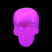Mangano Calcite skull 38*55*48mm 167g in UV light - Rocks and Things Store