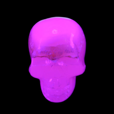 Mangano Calcite skull 38*55*48mm 167g in UV light - Rocks and Things Store