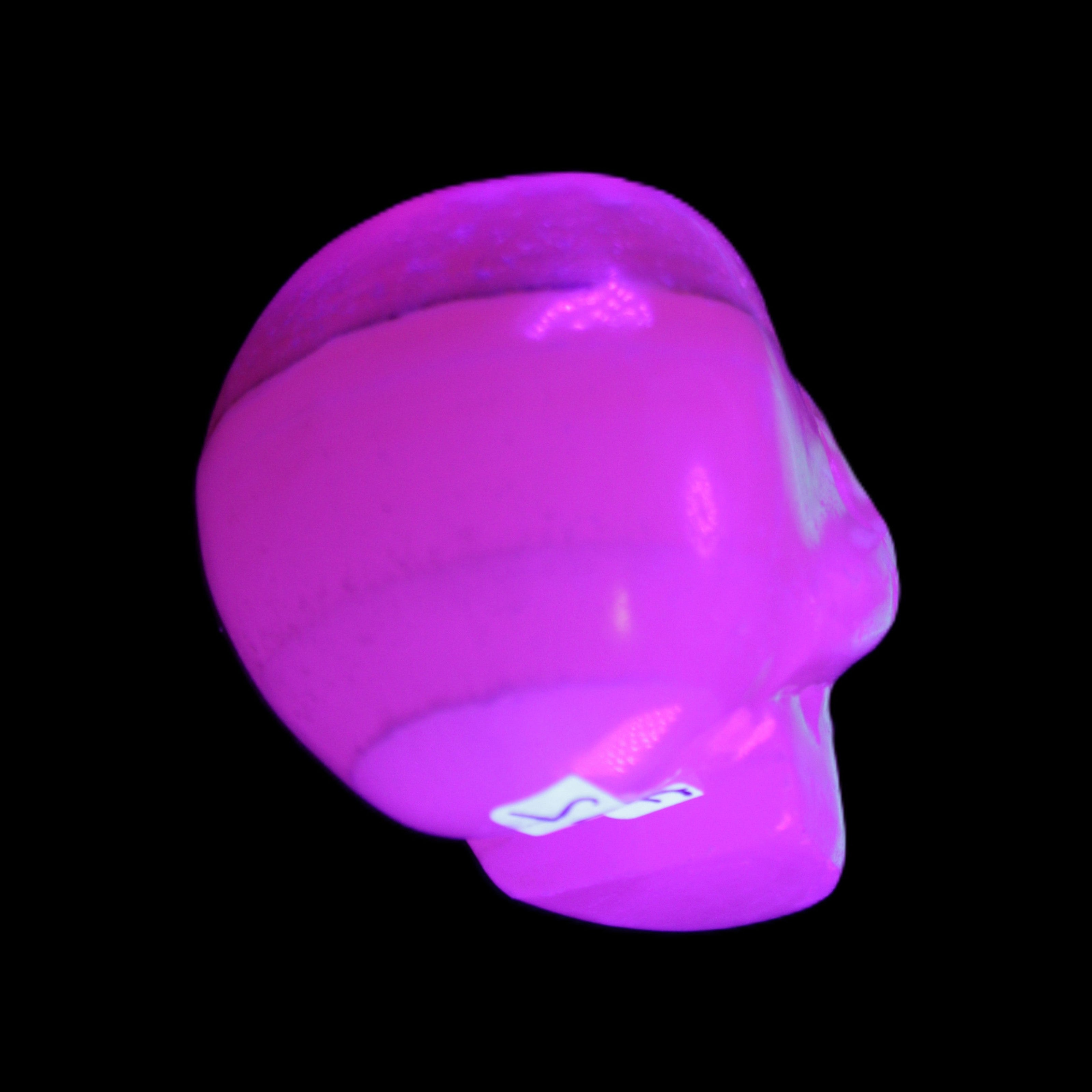 Mangano Calcite skull 38*55*48mm 167g in UV light - Rocks and Things Store