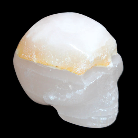 Mangano Calcite skull 38*55*48mm 167g in sunlight - Rocks and Things Store