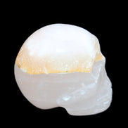 Mangano Calcite skull 38*55*48mm 167g in sunlight - Rocks and Things Store