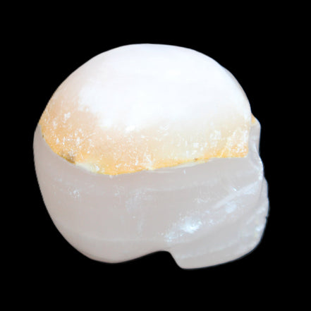 Mangano Calcite skull 38*55*48mm 167g in sunlight - Rocks and Things Store