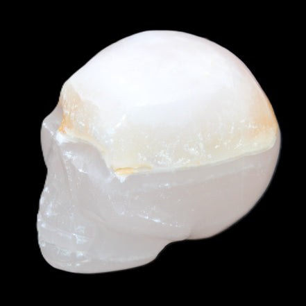 Mangano Calcite skull 38*55*48mm 167g in sunlight - Rocks and Things Store