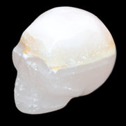 Mangano Calcite skull 38*55*48mm 167g in sunlight - Rocks and Things Store