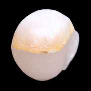 Mangano Calcite skull 38*55*48mm 167g in sunlight - Rocks and Things Store