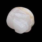 Mangano Calcite skull 38*55*48mm 167g in sunlight - Rocks and Things Store