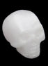 Mangano Calcite skull 32*45*38mm 87g in sunlight - Rocks and Things Store