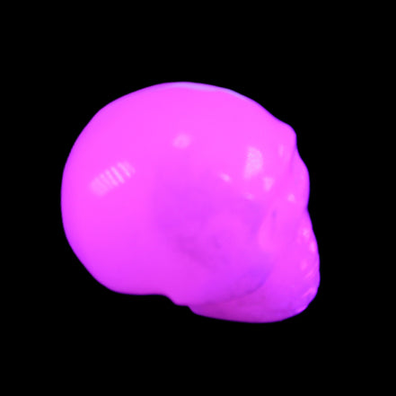 Mangano Calcite skull 32*45*38mm 87g in UV light - Rocks and Things Store