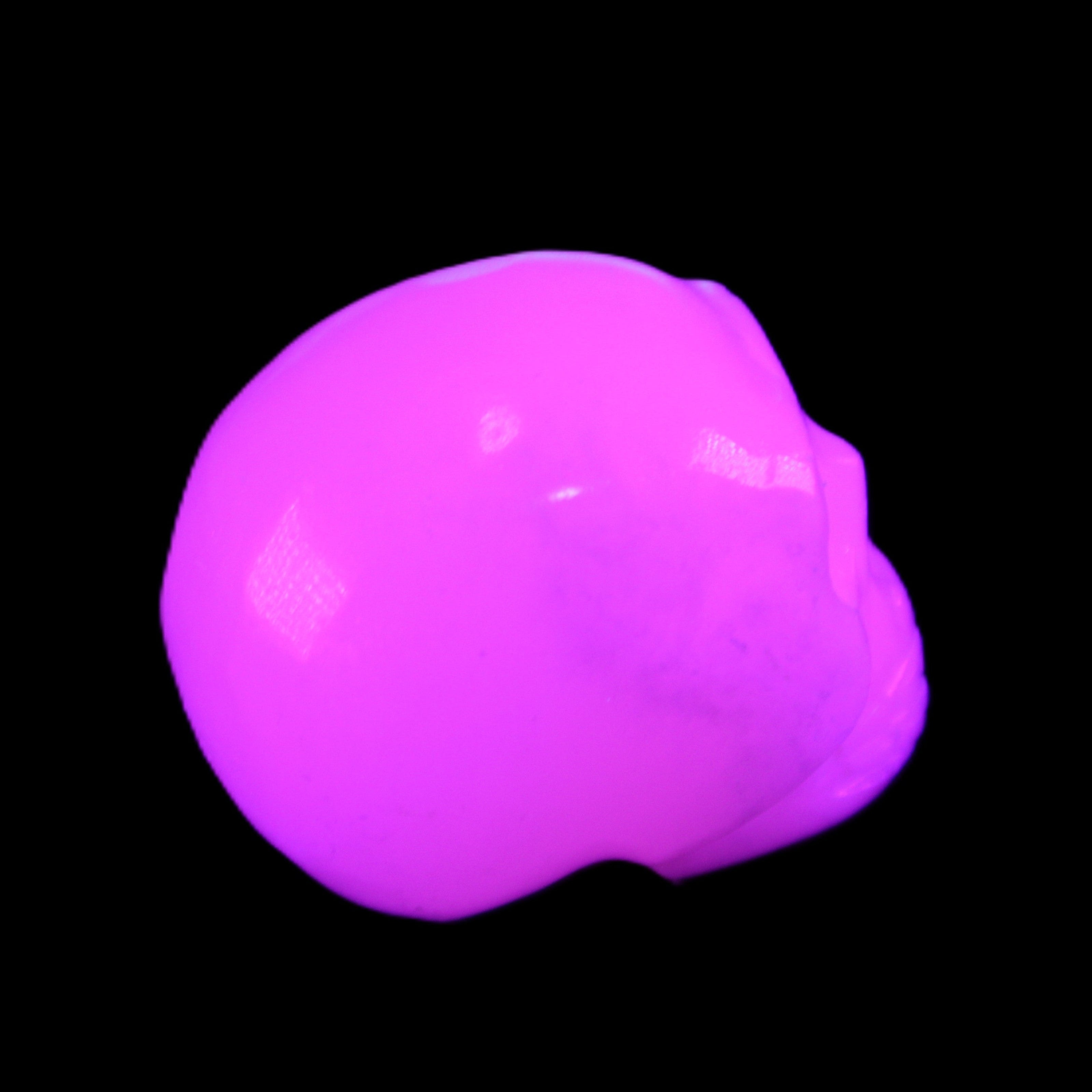 Mangano Calcite skull 32*45*38mm 87g in UV light - Rocks and Things Store