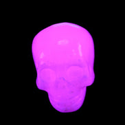 Mangano Calcite skull 32*45*38mm 87g in UV light - Rocks and Things Store
