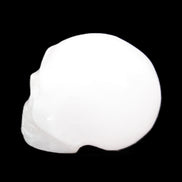 Mangano Calcite skull 32*45*38mm 87g in sunlight - Rocks and Things Store