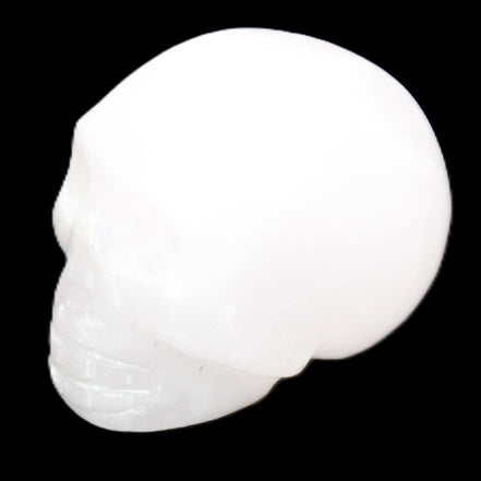 Mangano Calcite skull 32*45*38mm 87g in sunlight - Rocks and Things Store
