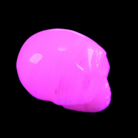 Mangano Calcite skull 28*45*35mm 81g in UV light - Rocks and Things Store
