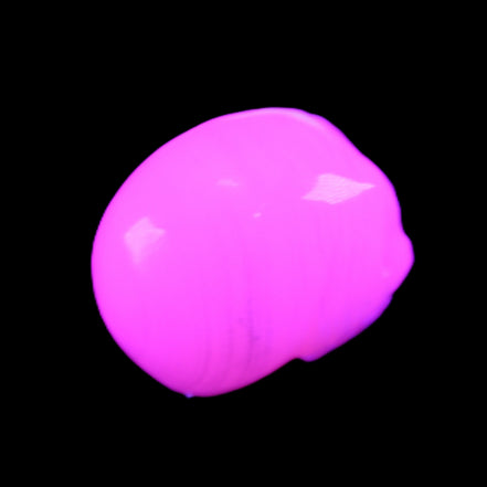 Mangano Calcite skull 28*45*35mm 81g in UV light - Rocks and Things Store