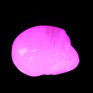 Mangano Calcite skull 28*45*35mm 81g in UV light - Rocks and Things Store