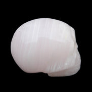 Mangano Calcite skull 28*45*35mm 81g in sunlight - Rocks and Things Store