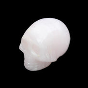 Mangano Calcite skull 28*45*35mm 81g in sunlight - Rocks and Things Store