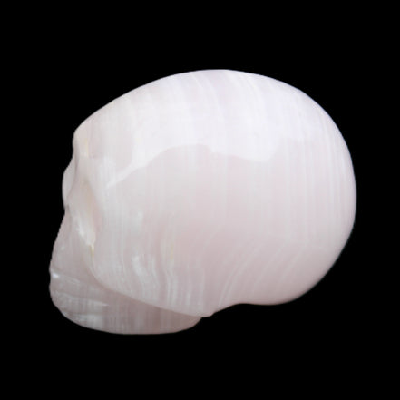 Mangano Calcite skull 28*45*35mm 81g in sunlight - Rocks and Things Store