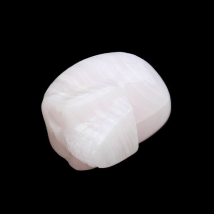 Mangano Calcite skull 28*45*35mm 81g in sunlight - Rocks and Things Store