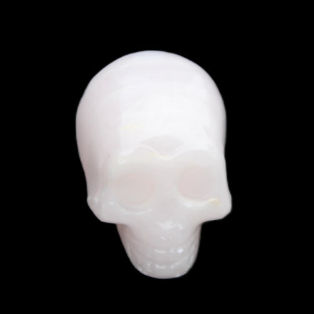 Mangano Calcite skull 28*45*35mm 81g in sunlight - Rocks and Things Store