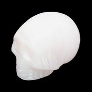 Mangano Calcite skull 28*45*35mm 81g in sunlight - Rocks and Things Store