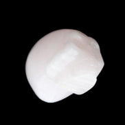 Mangano Calcite skull 28*45*35mm 81g in sunlight - Rocks and Things Store
