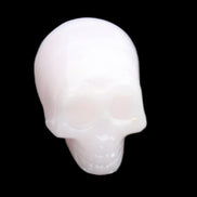 Mangano Calcite skull 28*45*35mm 81g in sunlight - Rocks and Things Store
